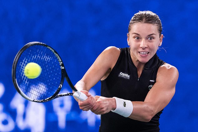 Maja Chwalinska of Poland returns a ball to Sonay Kartal of Britain during the women's singles final of 2026 Wuhan Open tennis tournament in Wuhan in central China's Hubei Province on Sunday, Oct. 18, 2026. (Chinatopix via AP)