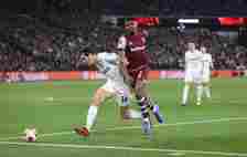 West Ham United's Ben Johnson and SC Freiburg's Merlin Rohl during the UEFA Europa League 2023/24 round of 16 second leg match between West Ham Uni...