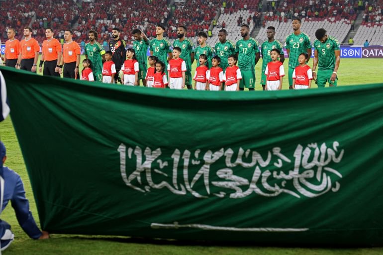 Soccer Football - World Cup - Asian Qualifiers - Third Round - Group C - Indonesia v Saudi Arabia - Gelora Bung Karno Main Stadium, Jakarta, Indonesia - November 19, 2024 Saudi Arabia players line up during the national anthems before the match REUTERS/Ajeng Dinar Ulfiana