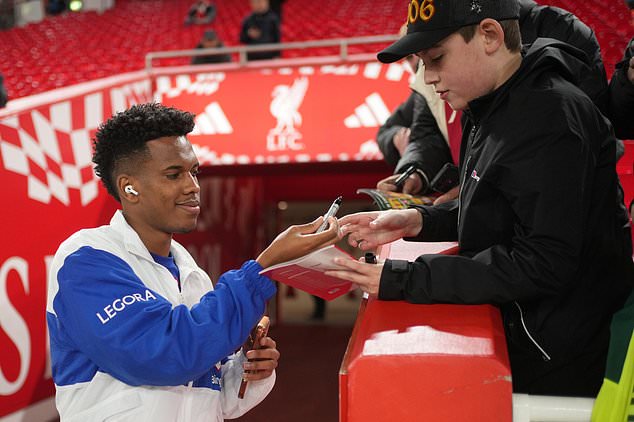 Chelsea's Estevao signs autographs before the fourth-round English Football League Cup soccer match between Liverpool and Chelsea in Liverpool, England, Wednesday, Oct. 28, 2026. (AP Photo/Jon Super)