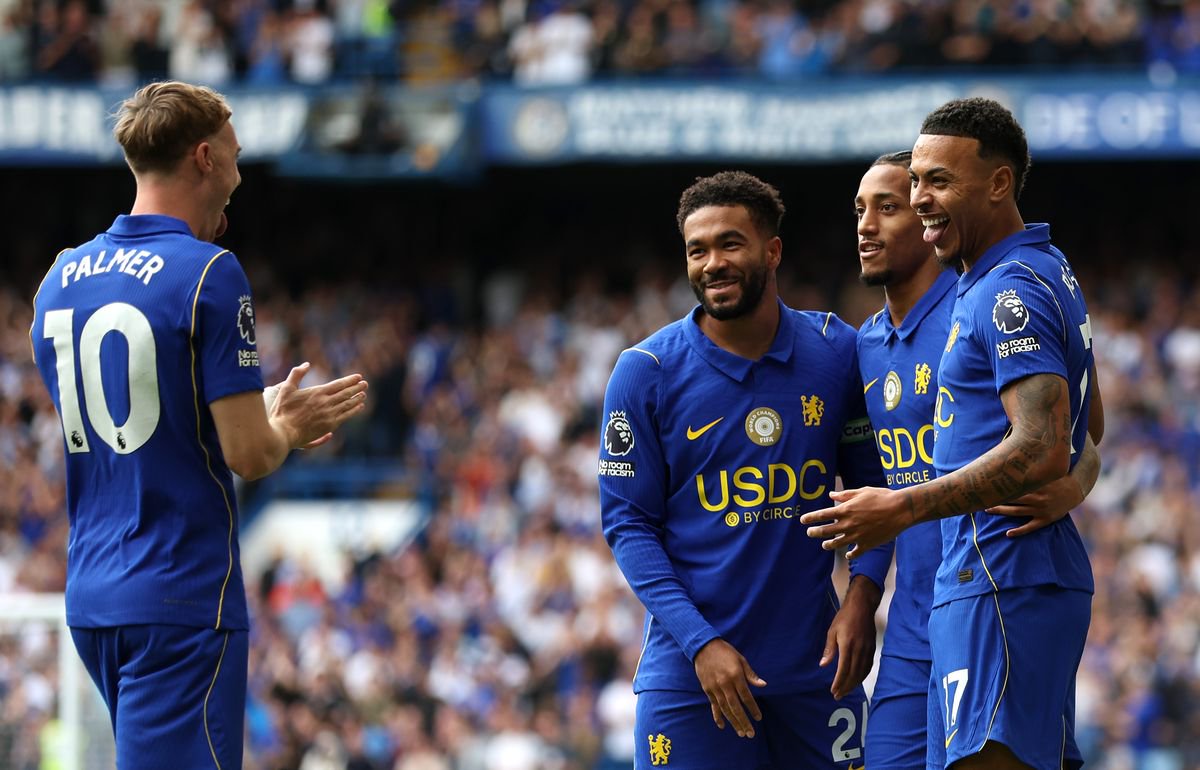 Chelsea players celebrate Morgan Rogers' goal against Hull City
