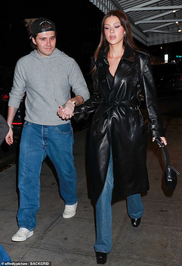 Brooklyn Beckham holds hands with wife Nicola Peltz as they step out to dinner in LA (Photos)