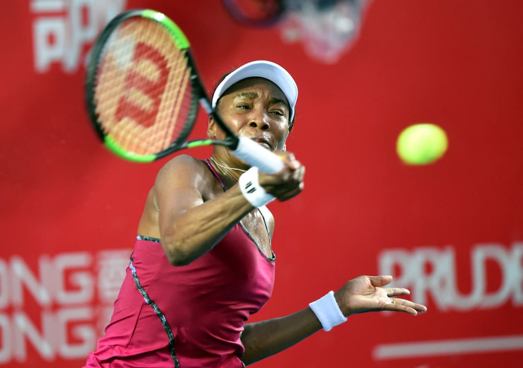 Venus Williams climbs into a shot during her 2017 Hong Kong Open defeat by Naomi Osaka. Photo: Xinhua