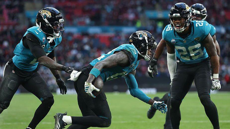 Travis Hunter of the Jacksonville Jaguars celebrates after intercepting a pass during his team's defeat by the Houston Texans at Wembley in October 2026
