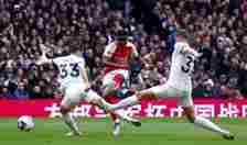 Bukayo Saka of Arsenal scores their teams second goal  during the Premier League match between Tottenham Hotspur and Arsenal FC at Tottenham Hotspu...