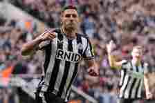 Newcastle United's Swiss defender #05 Fabian Schar celebrates after scoring their fourth goal during the English Premier League football match betw...