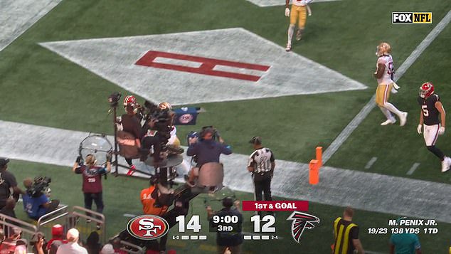 A camerawoman took a brutal shot from a Falcons player during their clash with the 49ers