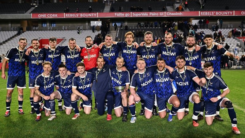 Scotland players celebrate after victory in the 2026 Hurling/Shinty International match between Ireland and Scotland at SuperValu Páirc Uí Chaoimh in Cork