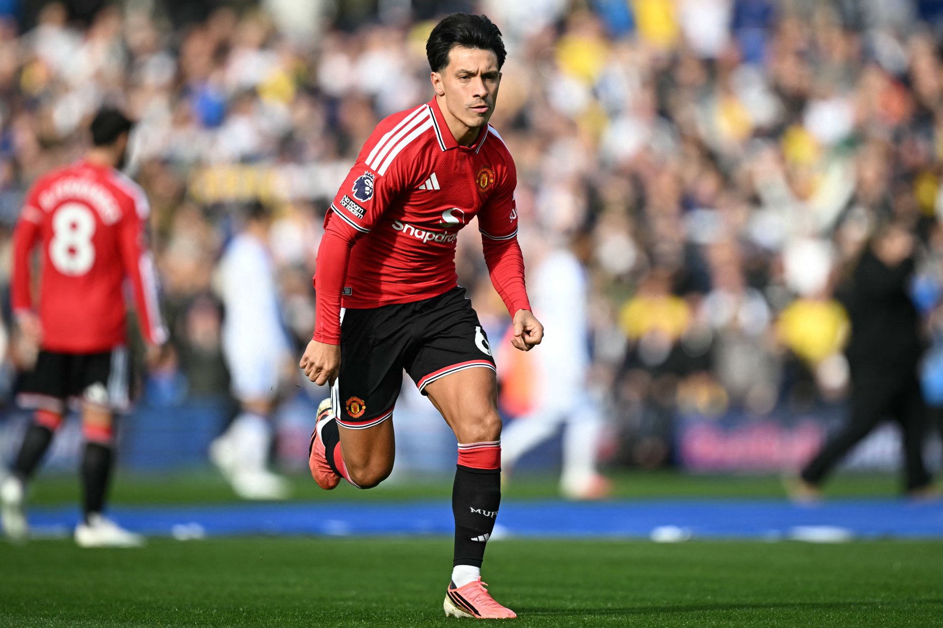 Lisandro Martinez playing for Man United