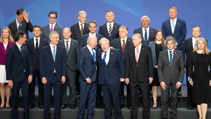 U.K. Prime Minister Boris Johnson stands beside U.S. President Joe Biden and other world leaders posing for the family photo during the Nato summit on June 29, 2022 in Madrid, Spain.