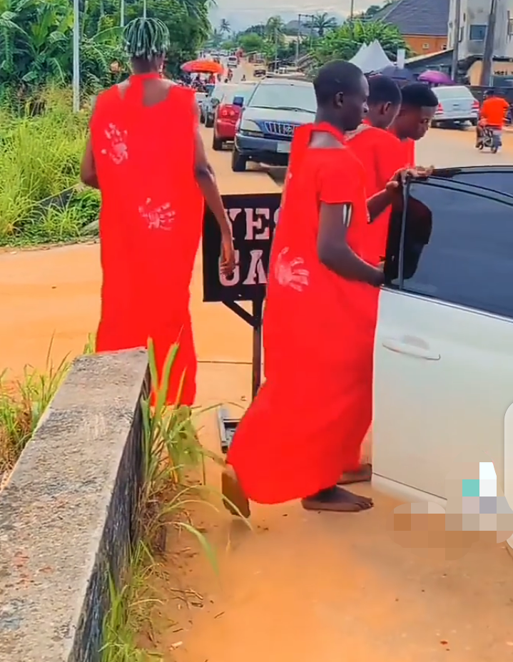 3 young men spotted doing ritual in a river with their mallam (photos)