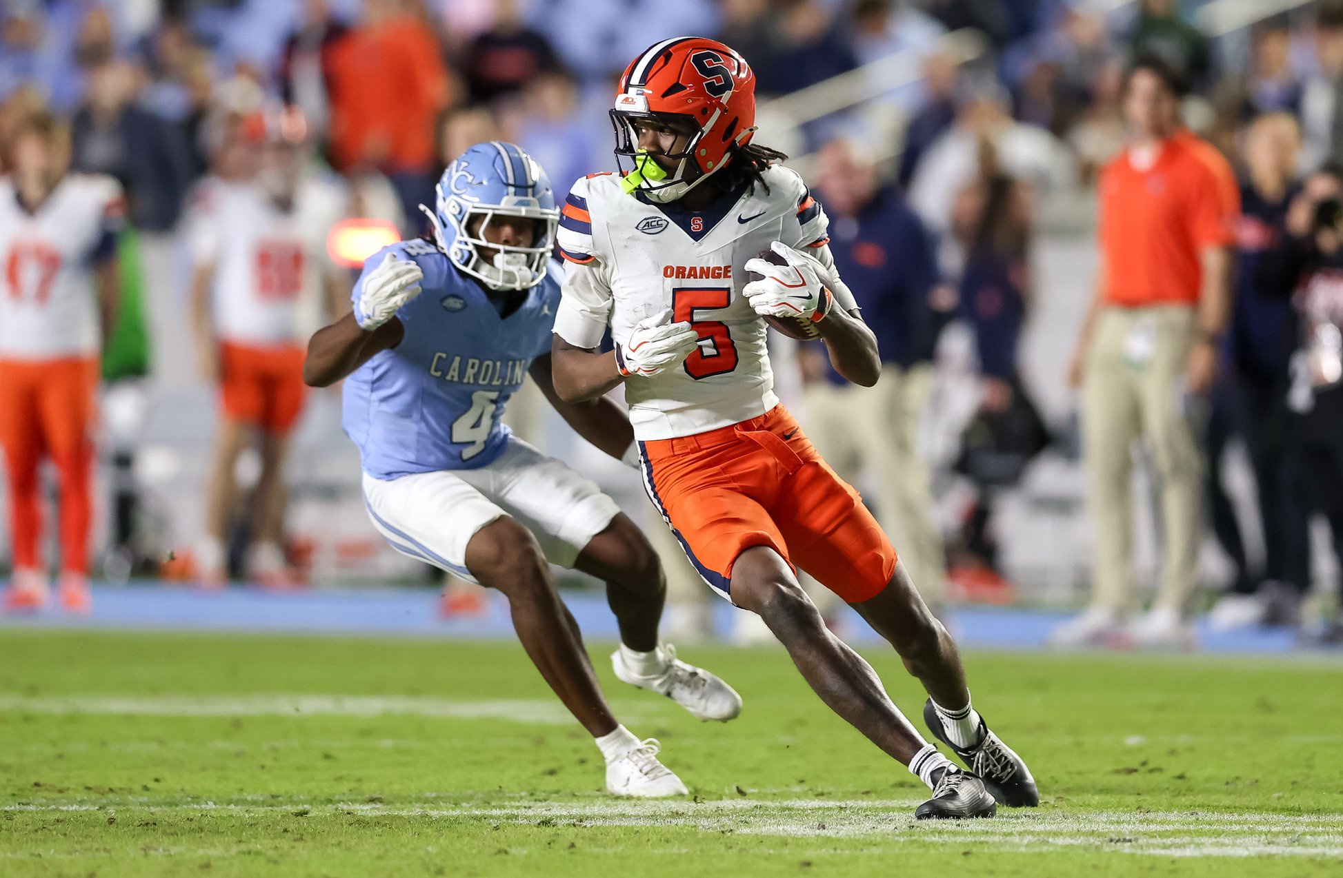 Oct 24, 2026; Chapel Hill, North Carolina, USA;  Syracuse Orange wide receiver Calvin Russell III (5) runs with the ball during the fourth quarter against North Carolina Tar Heels at Kenan Stadium.  Mandatory Credit: Cory Knowlton-Imagn Images