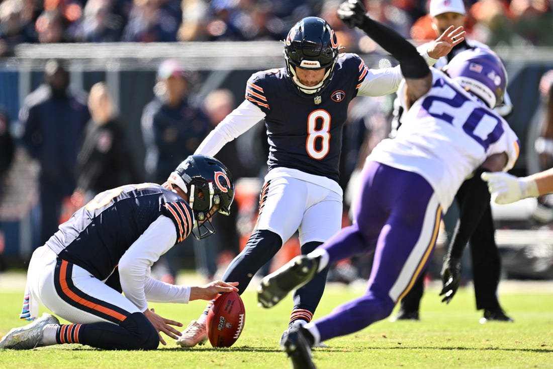 Oct 15, 2023; Chicago, Illinois, USA;  Chicago Bears kicker Cairo Santos (8) kicks a 53-yard field goal in the first half against the Minnesota Vikings at Soldier Field. Mandatory Credit: Jamie Sabau-USA TODAY Sports