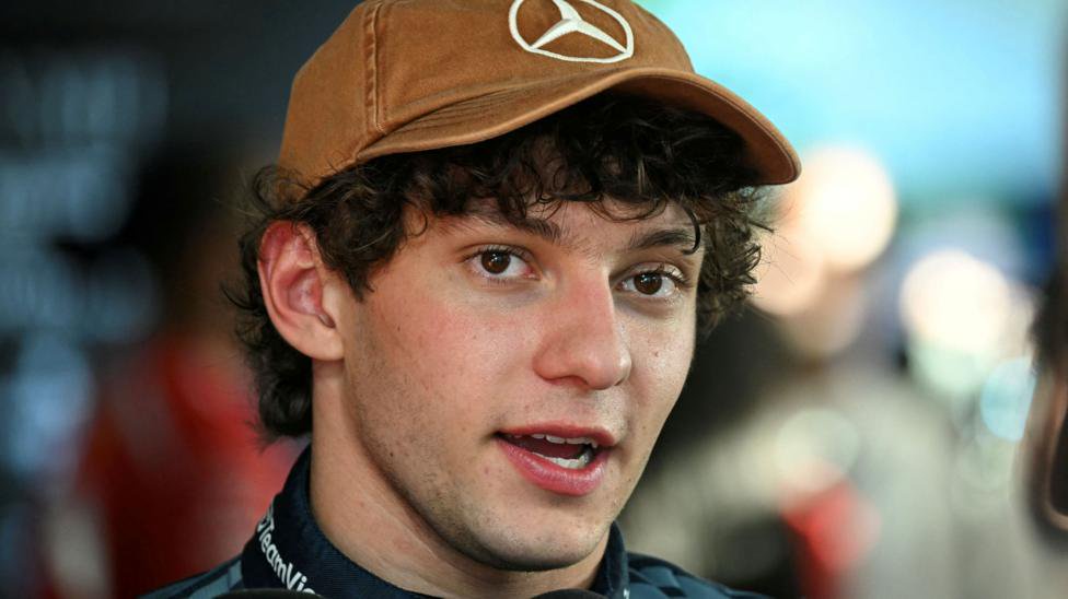 Kimi Antonelli wearing a Mercedes cap after taking pole position for the United States Grand Prix