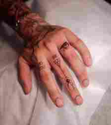 cool combination of finger tattoos