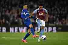 Ollie Watkins of Aston Villa controls the ball whilst under pressure from Thiago Silva of Chelsea during the Premier League match between Aston Vil...