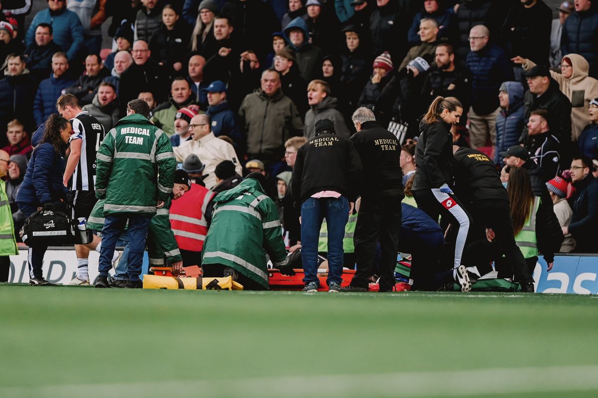 Edon Pruti goes off injured during Grimsby Town's match against Northampton Town
