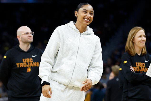 FILE - USC guard Juju Watkins (12) looks on from the sideline before the game against California during an NCAA basketball game on Dec. 21, 2025, in San Francisco. (AP Photo/Lachlan Cunningham, File)