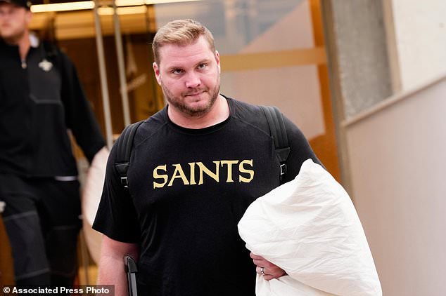 New Orleans Saints' David Edwards arrives at the reception pavilion of Charles de Gaulle airport in Roissy north of Paris, Monday, Oct. 19, 2026. (AP Photo/Teresa Suarez)