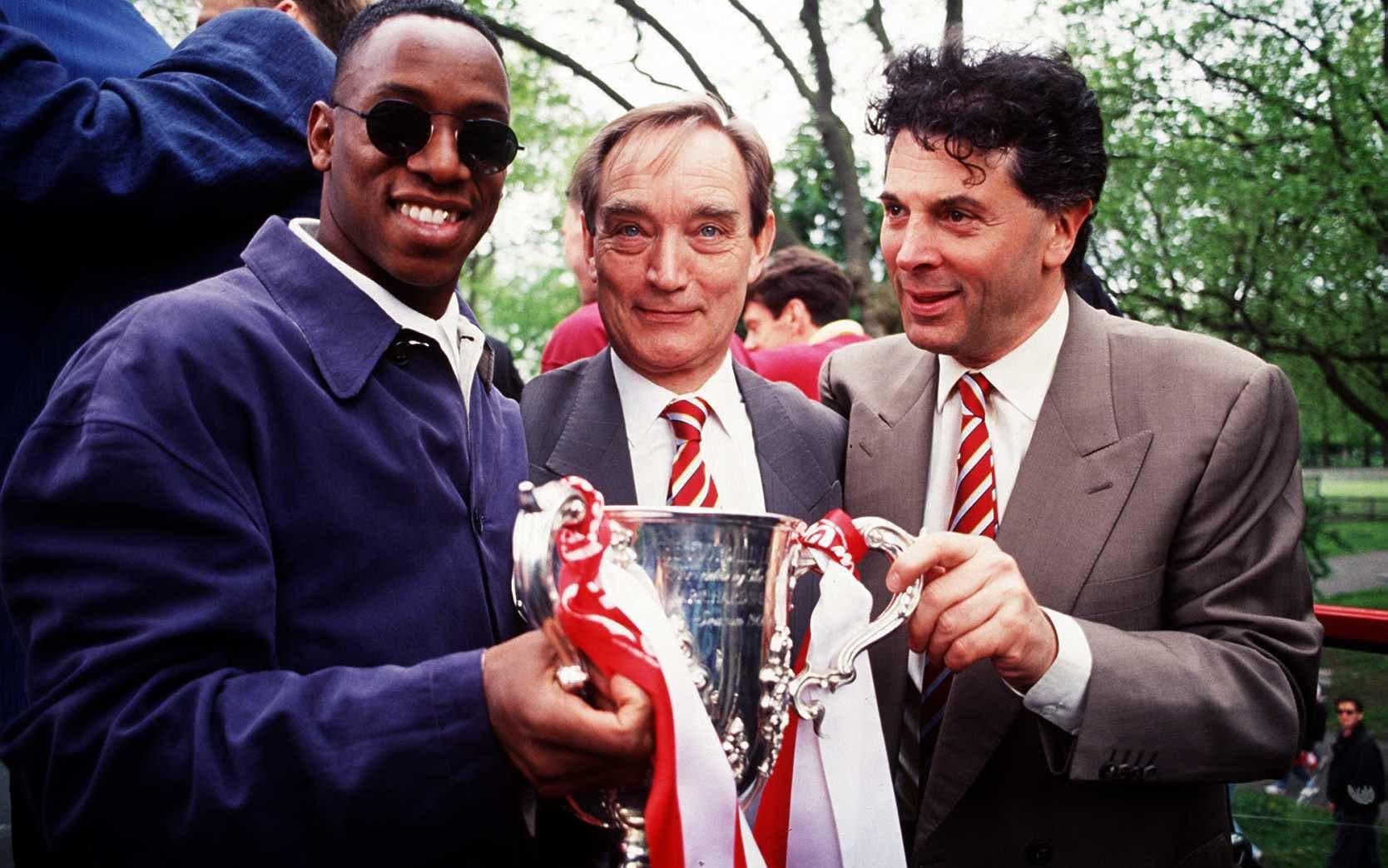 Ken Friar, centre, with the then Arsenal striker Ian Wright and vice-chairman David Dein following victory in the 1993 League Cup final