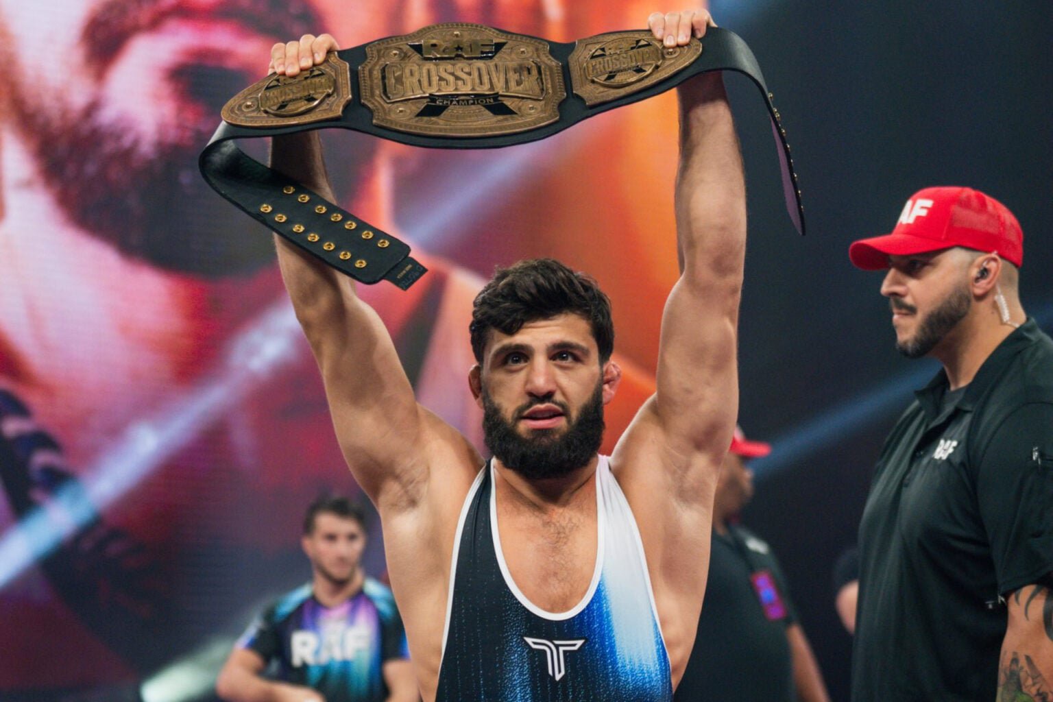 Arman Tsarukyan holds up the RAF middleweight crossover title after beating Dillon Danis