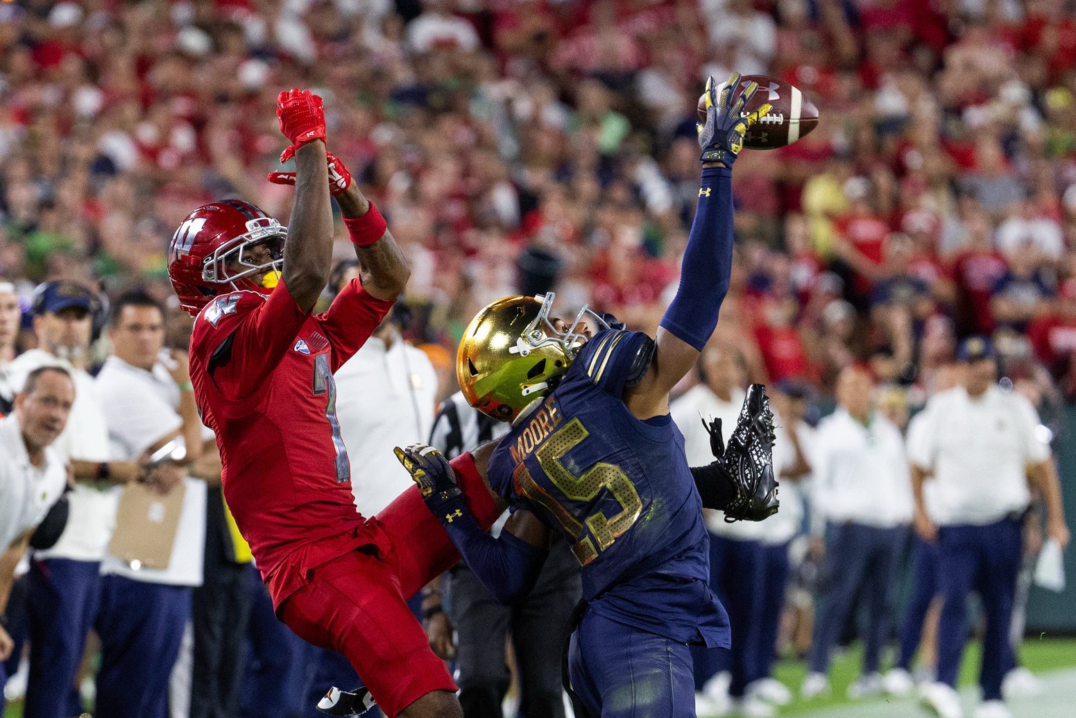 Sep 6, 2026; Green Bay, Wisconsin, USA;  Notre Dame Fighting Irish cornerback Leonard Moore (15) breaks up a pass against the Wisconsin Badgers at Lambeau Field.  Mandatory Credit: Trevor Ruszkowski-Imagn Images