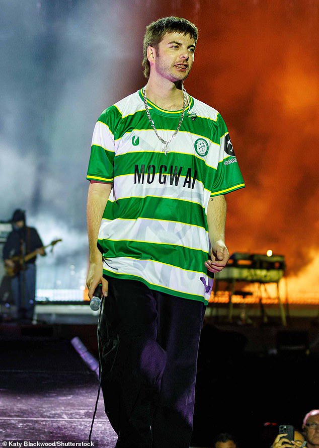 Grian Chatten, frontman of rock band Fontaines DC, wore the semi-professional football club Cwmbran Celtic's shirt at Reading Festival this summer