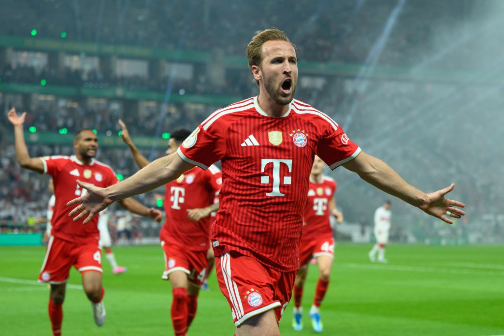 Harry Kane celebrates scoring a goal for Bayern Munich with his teammates.