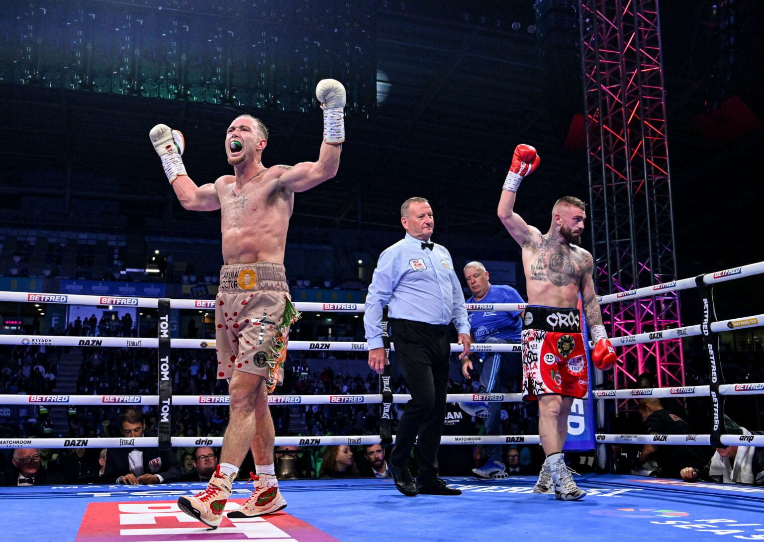 Paddy Donovan and Lewis Crocker react after their 12-round fight in Belfast