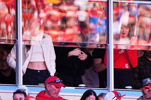 WNBA player Caitlin Clark, from left, Este Haim, and Taylor Swift watch play between the Los Angeles Chargers and Kansas City Chiefs during the first half of an NFL football game in Kansas City, Mo., Sunday, Oct. 18, 2026. (AP Photo/Charlie Riedel) Adds Este Haim