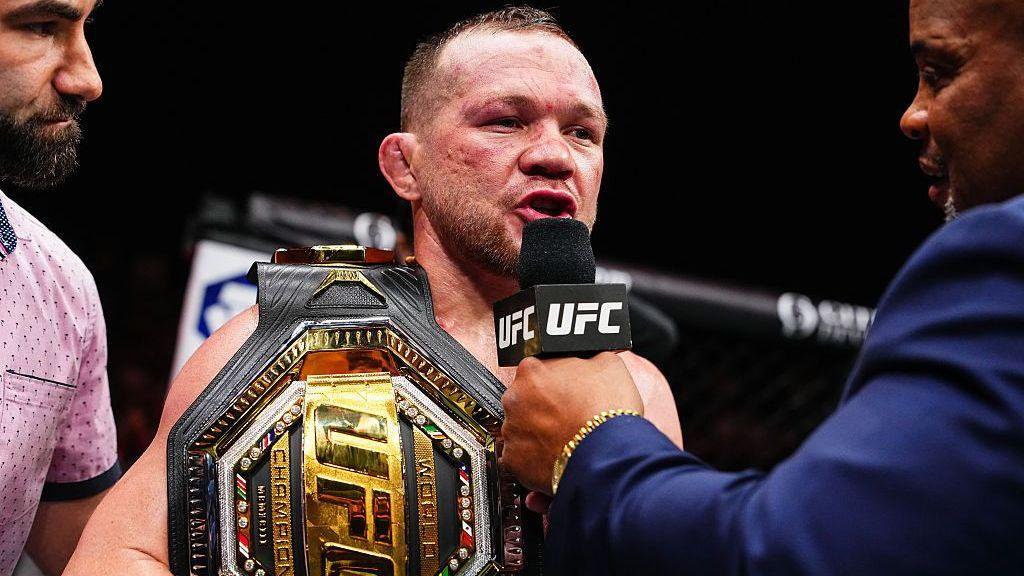Petr Yan collects his UFC belt 