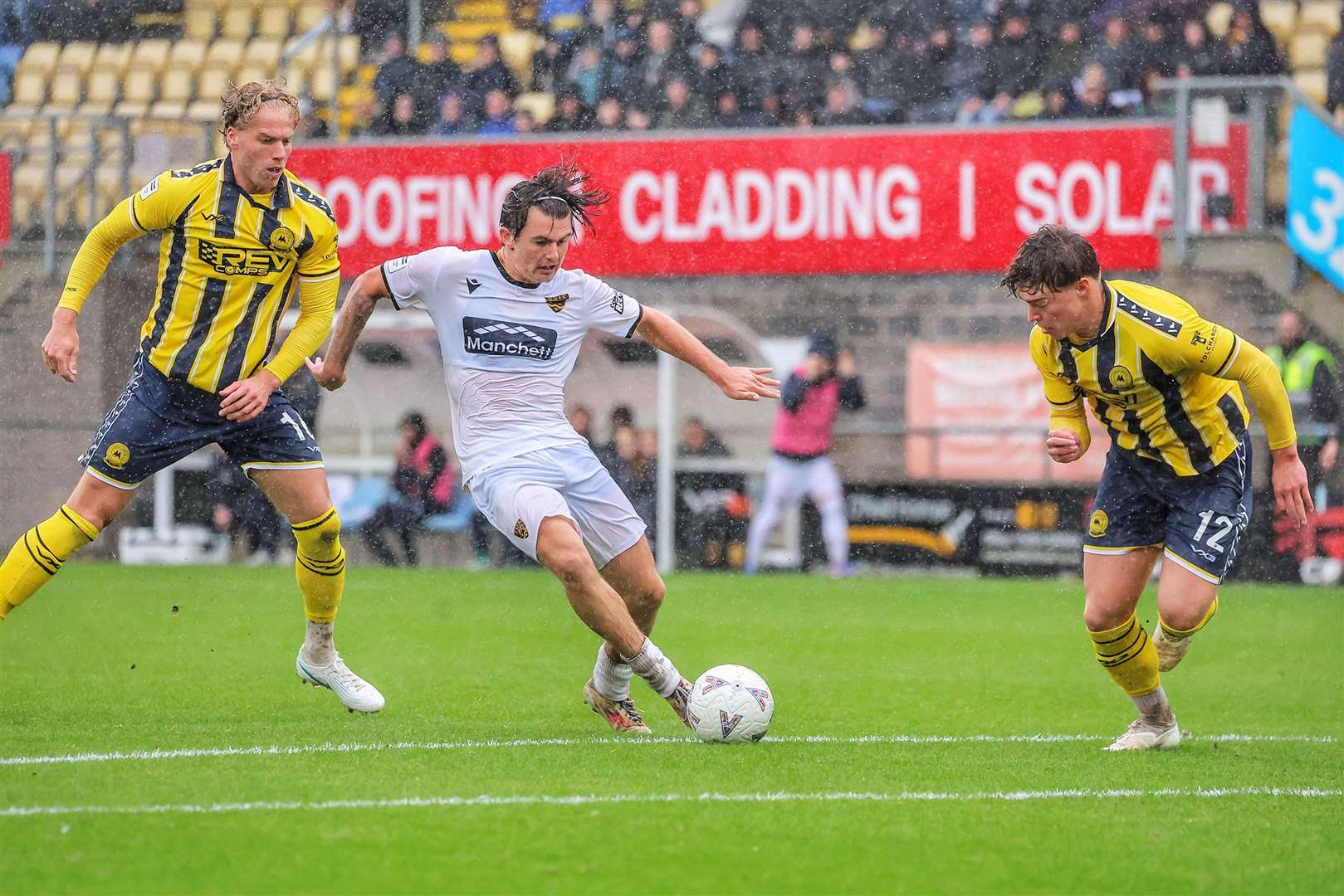 Riley Court works his way to the edge of the Torquay box. Picture: Helen Cooper