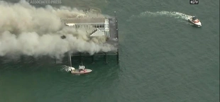 Firefighters contain destructive fire on landmark wooden pier on the Southern California coast