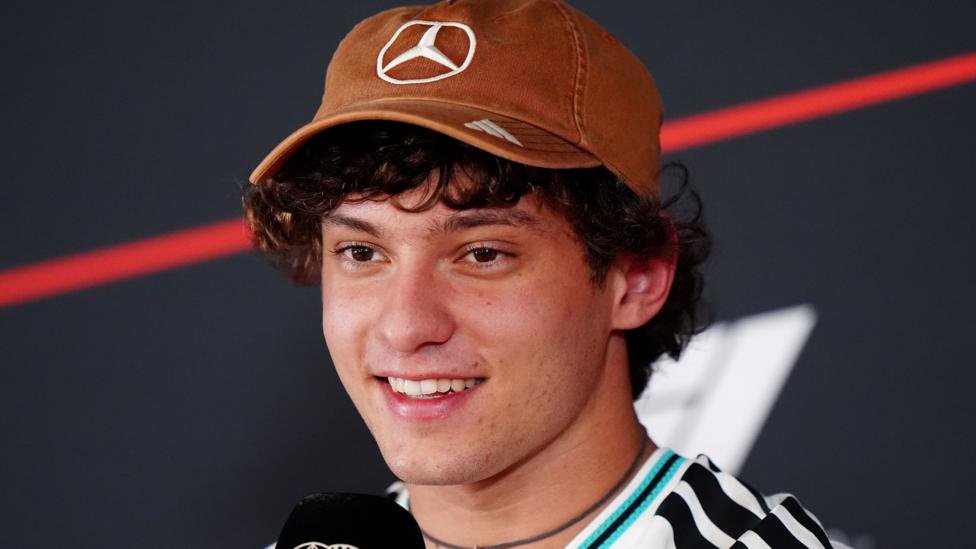 Kimi Antonelli smiling in an official news conference at the United States Grand Prix