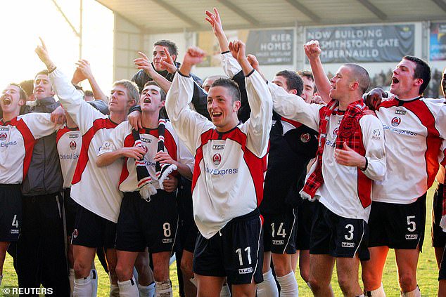 Clyde's players led by captain Michael McGowan (centre) celebrate their historic victory over their mighty visitors