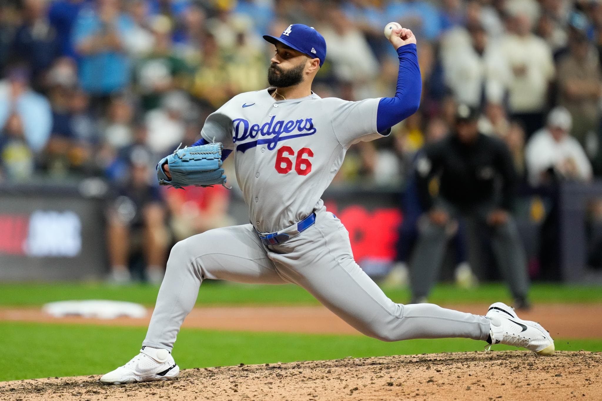 Los Angeles Dodgers pitcher Tanner Scott throws during a game against the Milwaukee Brewers.