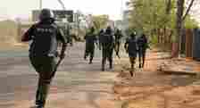 Nigerian Police officers on the run (Illustraton - NewDawnNigeria)