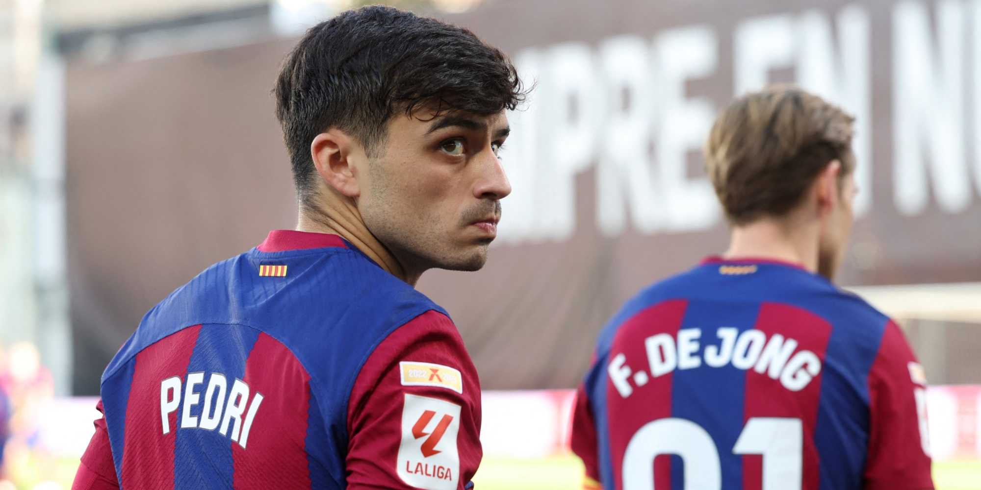 Pedri looks on