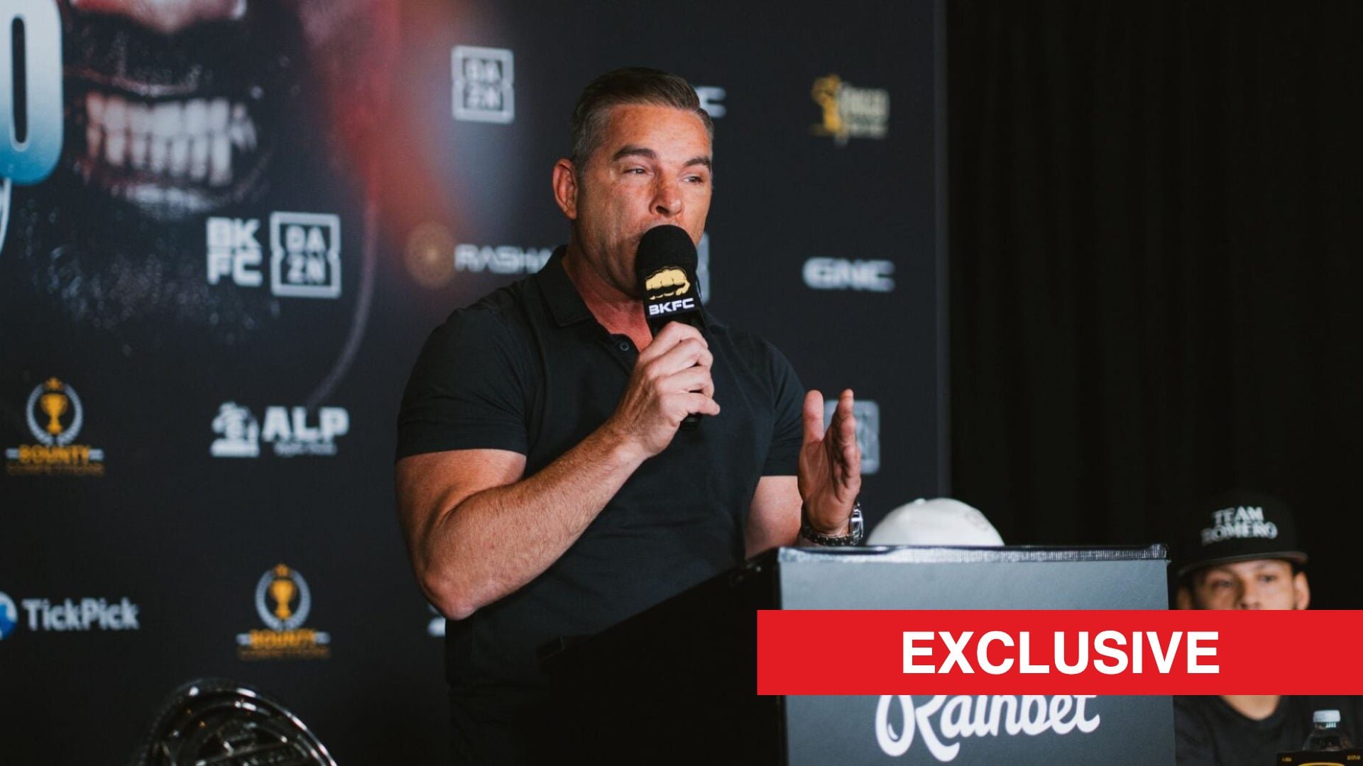 Dave Feldman speaks on stage at the BKFC 94 press conference