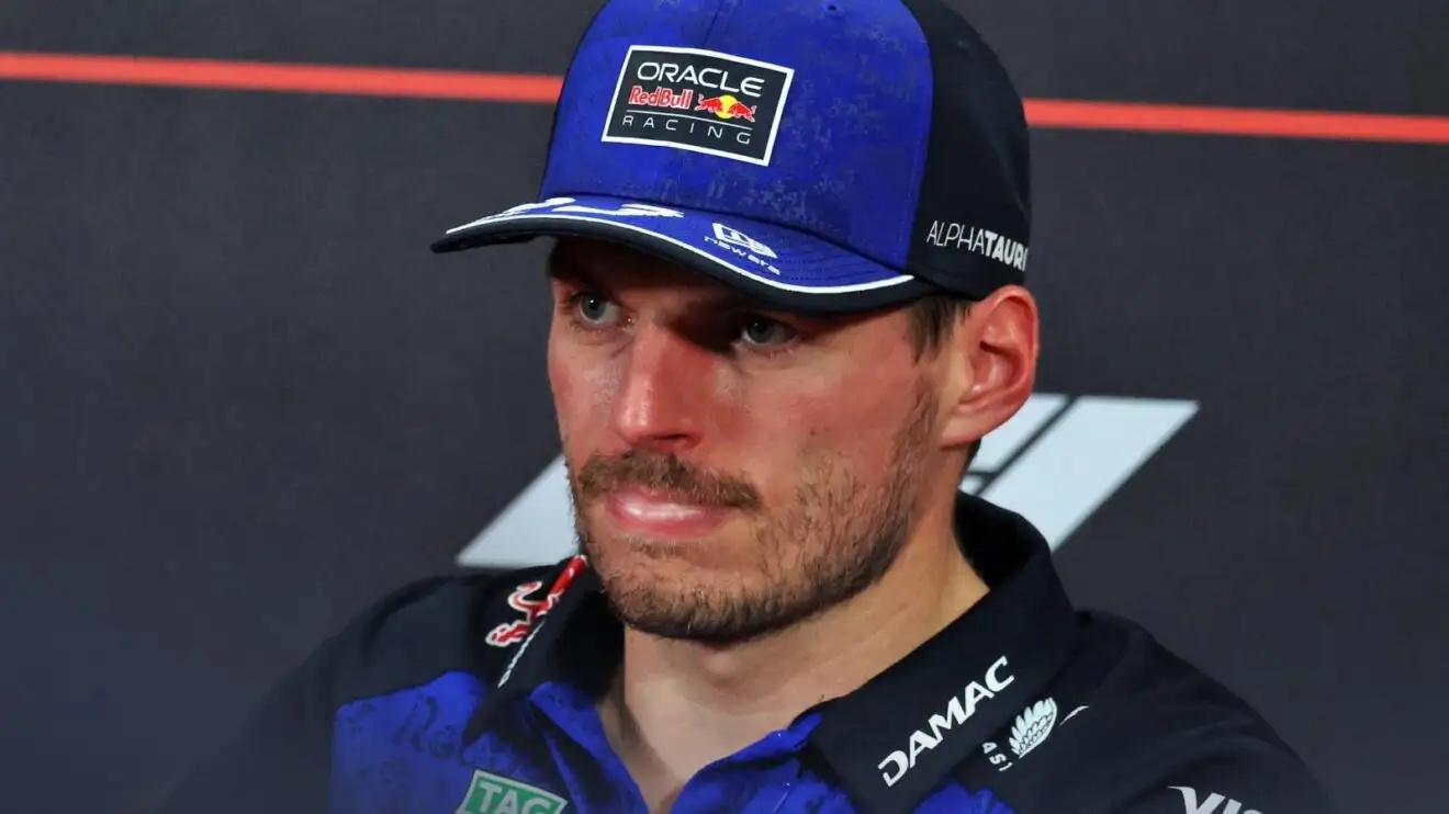 Red Bull driver Max Verstappen sits in a press conference.