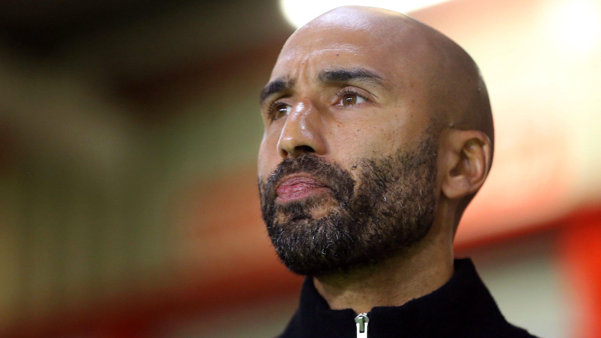 Walsall boss Lee Grant grimaces as he watches the Saddlers' 4-2 home defeat by League Two leaders Salford City at Bescot Stadium