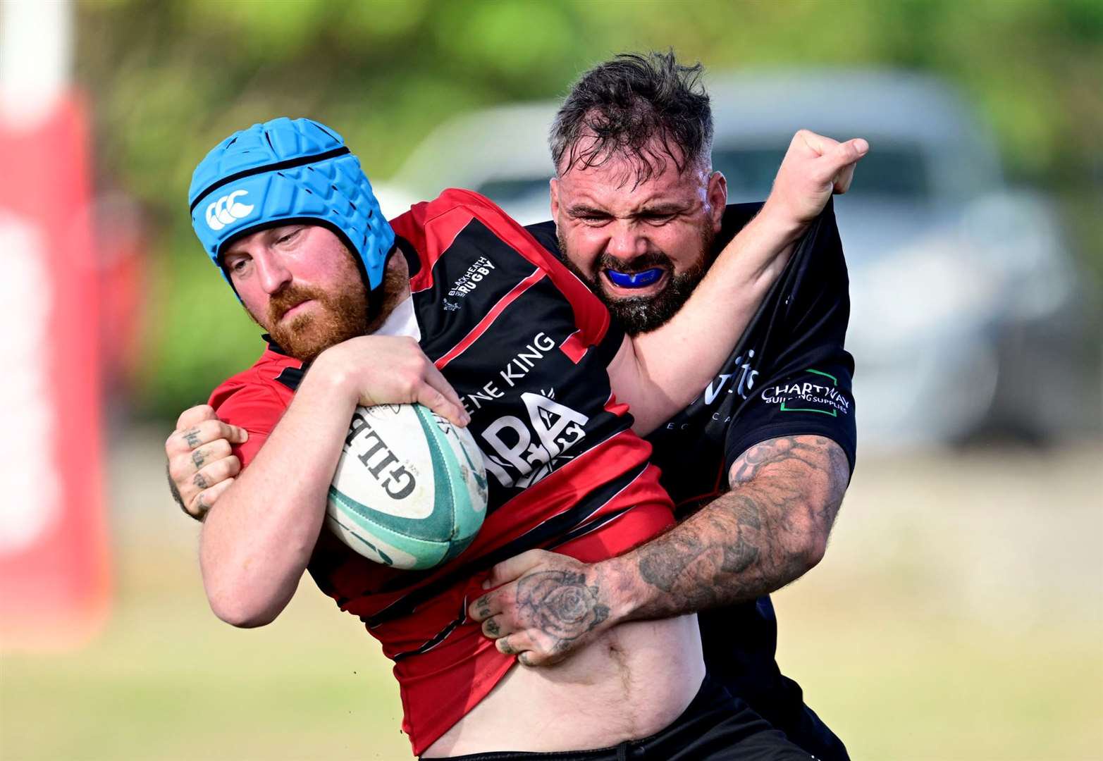 Sheppey’s Jordan Bowes gets to grips with Blackheath 3rds in Kent 4 last weekend. Picture: Barry Goodwin