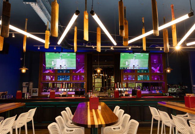 A view inside a Sixes Social Cricket venue.