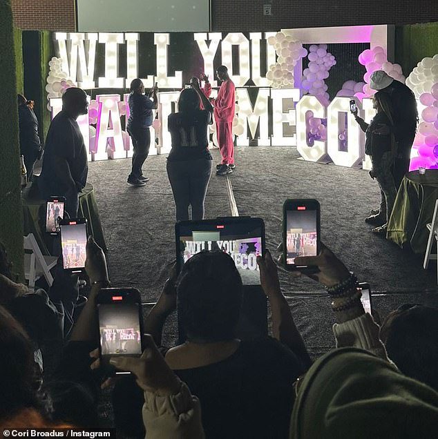Family affair: Friends and family had their phones and pads at the ready to record the proposal