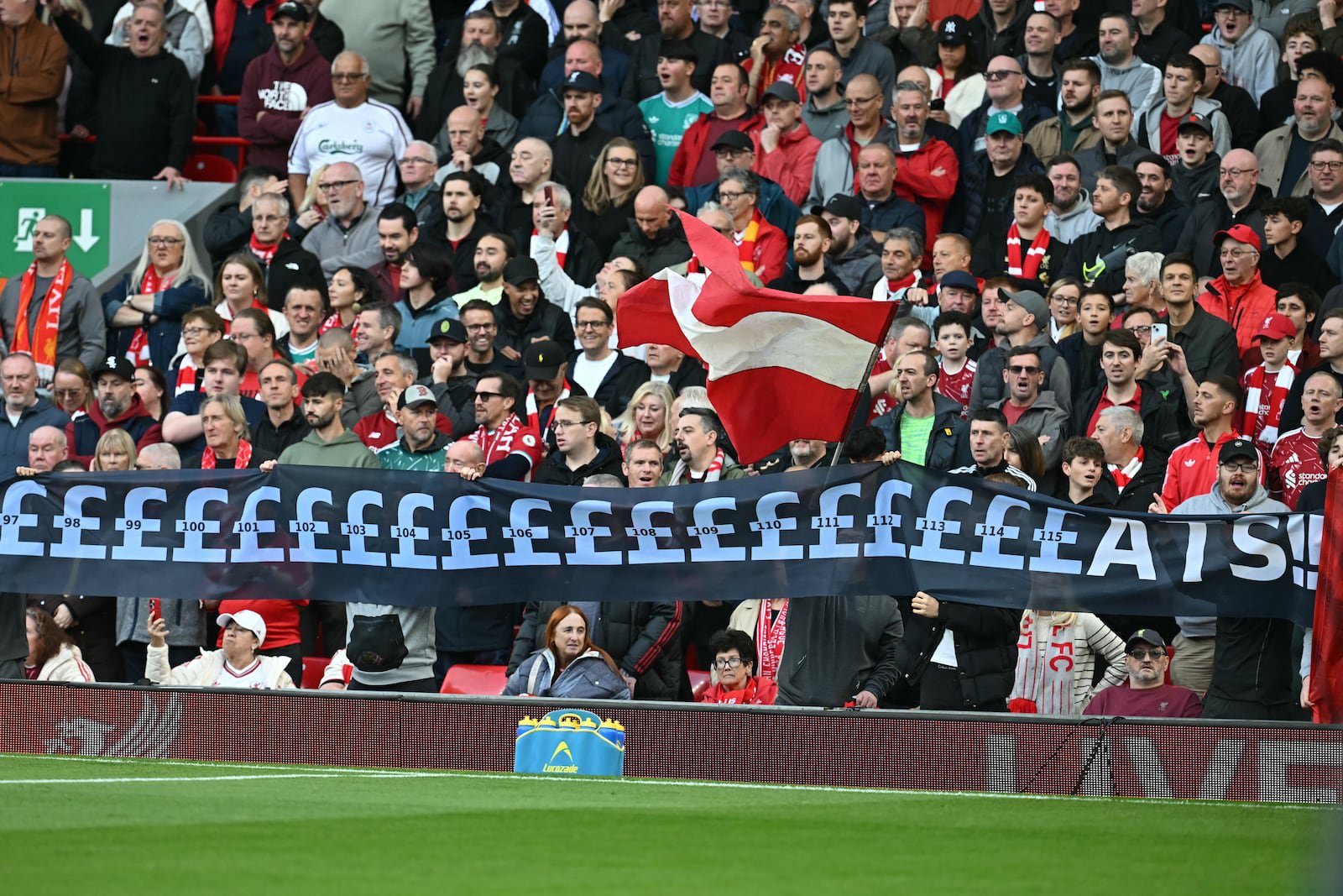 Liverpool fans hold up a banner mocking Manchester City's financial scandal at the Premier League match between the two at Anfield on October 11th. Photograph: Paul Ellis/AFP via Getty Images