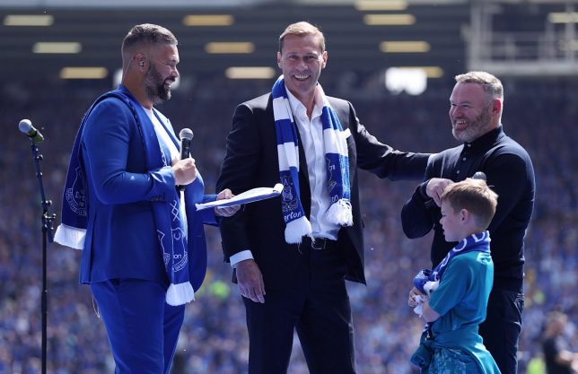 LIVERPOOL, ENGLAND - MAY 18: Former Everton players Duncan Ferguson, centre, and Wayne Rooney are interviewed by Tony Bellew after the Premier League match between Everton FC and Southampton FC at Goodison Park on May 18, 2025 in Liverpool, England. (Photo by Alex Livesey - Danehouse/Getty Images)