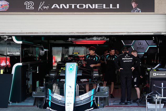 Mercedes crew work on the Andrea Kimi Antonelli's car in their team garage ahead of the Formula One Mexico Grand Prix in Mexico City, Thursday, Oct. 29, 2026. (AP Photo/Fernando Llano)
