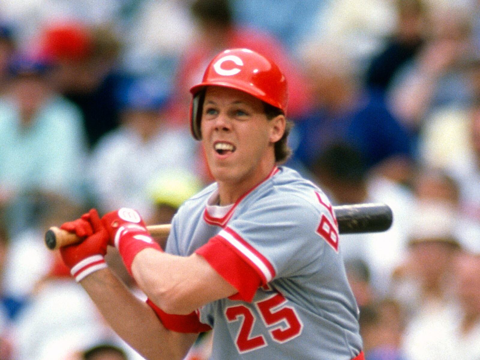 CHICAGO, IL - CIRCA 1990:  Todd Benzinger #25 of the Cincinnati Reds bats against the Chicago Cubs during an Major League Baseball game circa 1990 at Wrigley Field in Chicago, Illinois.  Benzinger played for the Reds from 1989-91. (Photo by Focus on Sport/Getty Images)