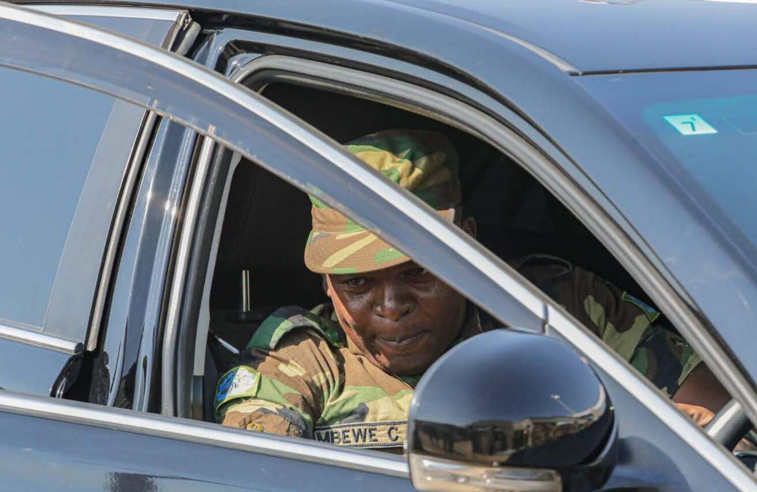 Chisi Mbewe in a car gifted to him by Red Arrows FC