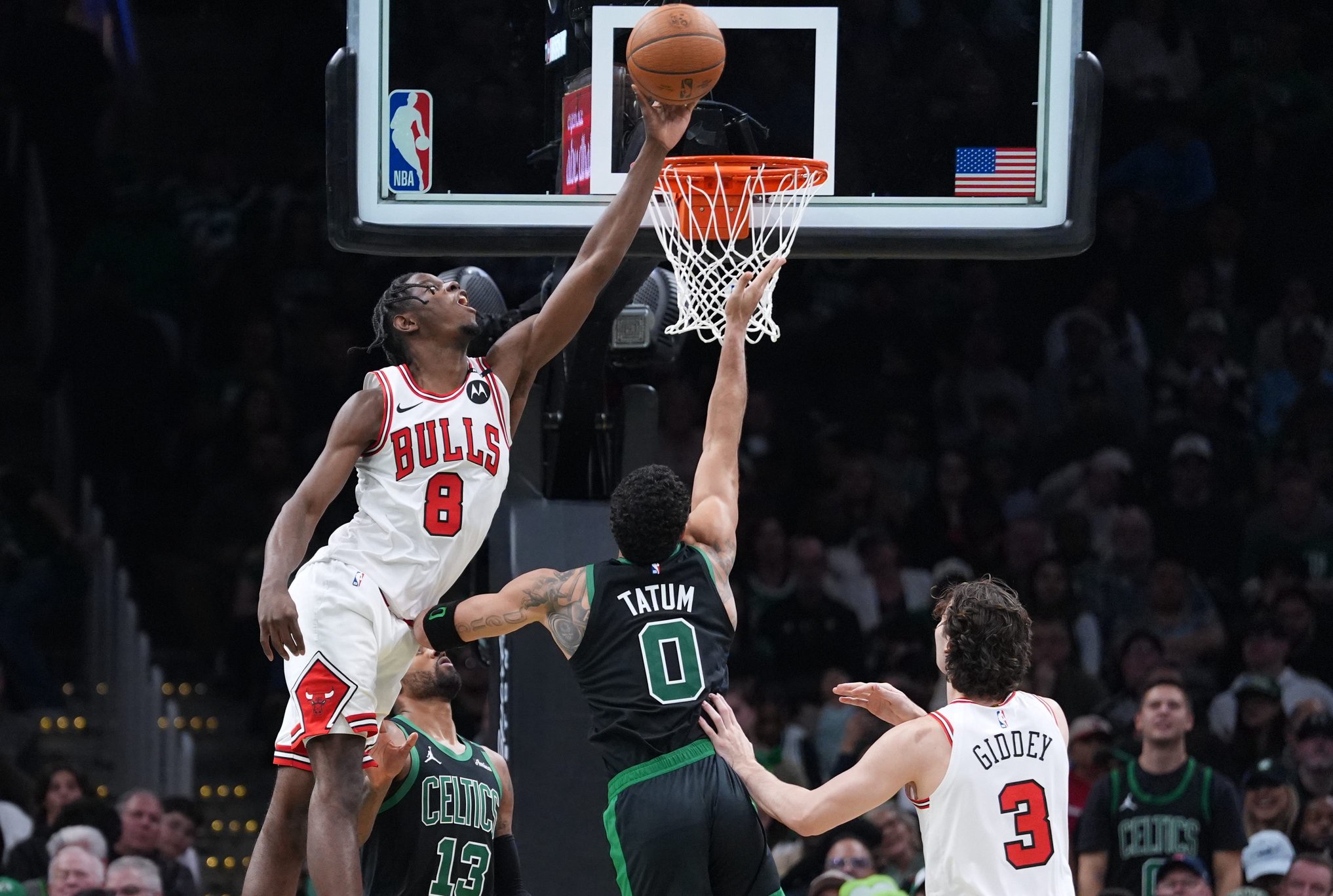 Oct 30, 2026; Boston, Massachusetts, USA; Chicago Bulls forward Caleb Wilson (8) blocks the shot of Boston Celtics forward Jayson Tatum (0) in the second half at TD Garden. Mandatory Credit: David Butler II-Imagn Images